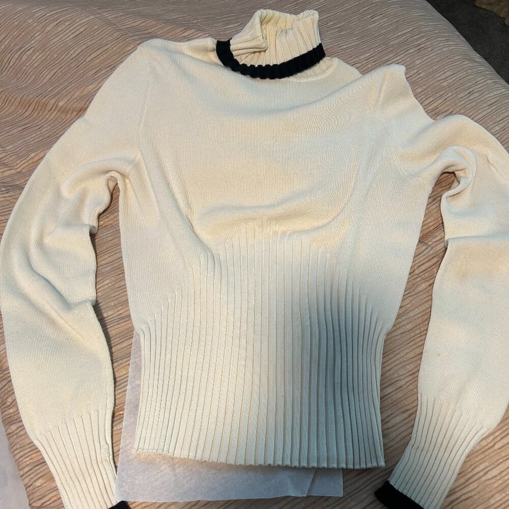 White with black trim turtleneck sweater